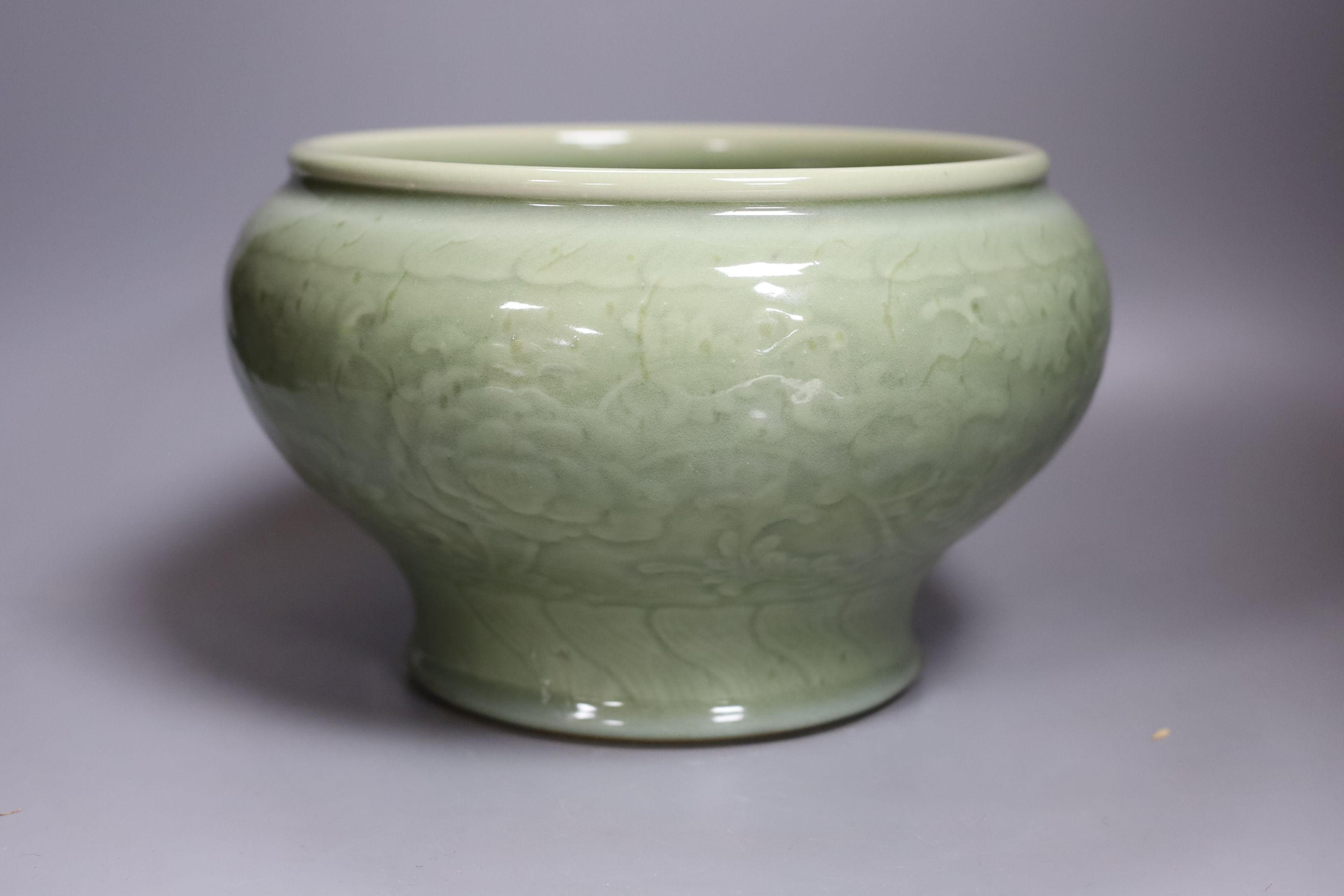 A Chinese celadon glazed bowl - 17.5cm tall